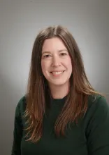 Portrait of Marissa Walinga wearing a dark green sweater.